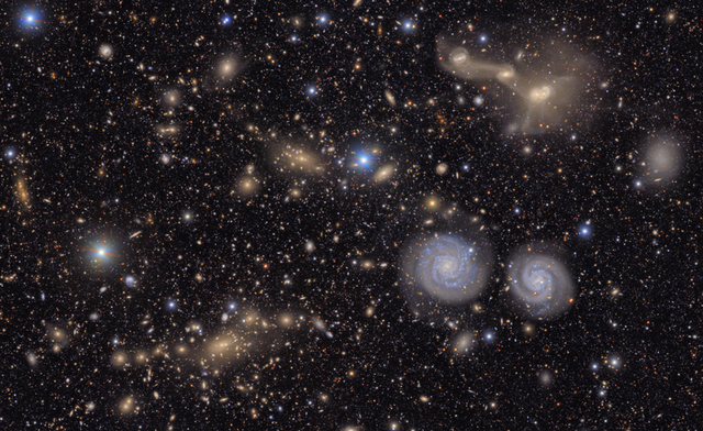 Deep-field image from Rubin Observatory showing thousands of galaxies of various shapes, sizes, and colors against the dark background of space. Spiral galaxies, elliptical galaxies, and distant faint objects are visible throughout the field.