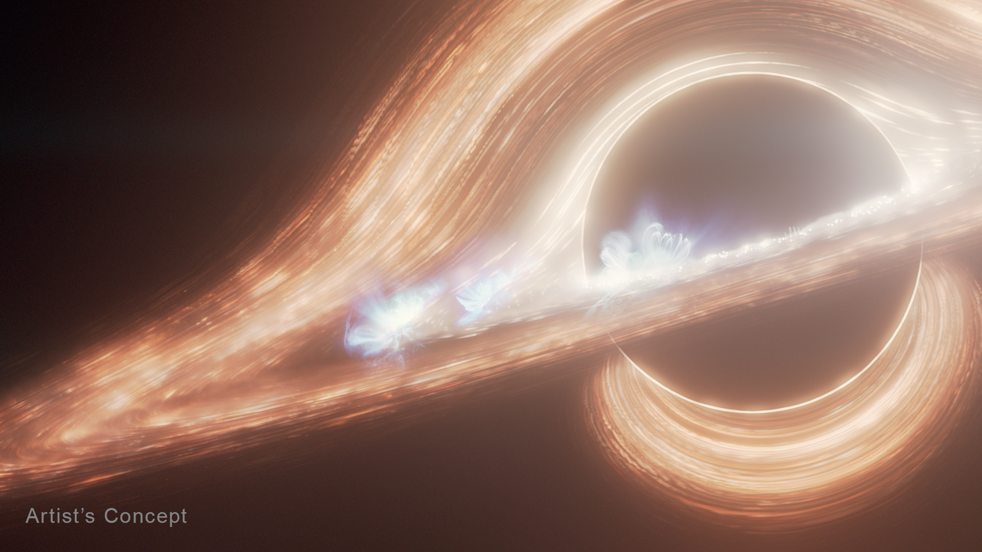Artist rendering of a supermassive black hole surrounded by a bright orange accretion disk, with light paths visibly warped by extreme spacetime curvature near the event horizon
